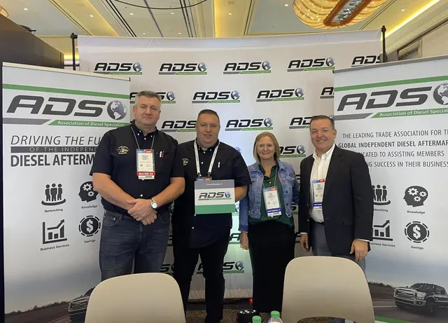 The owners of Turbo Reman Center with the Association of Diesel Specialists team at the ADS booth