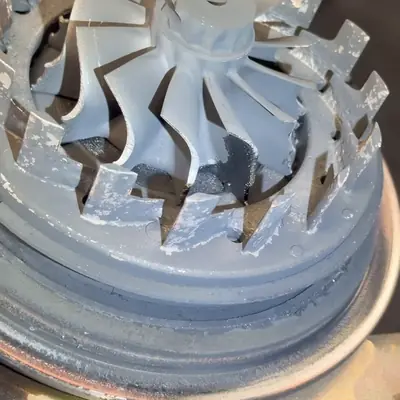 Close-up of the turbine wheel and VGT vanes on the bench