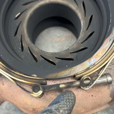 A worn VGT vane ring in the turbine housing