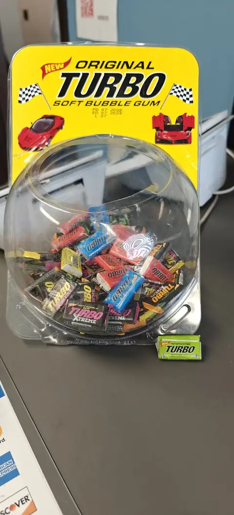 A jar of Turbo bubble gum at the shop counter