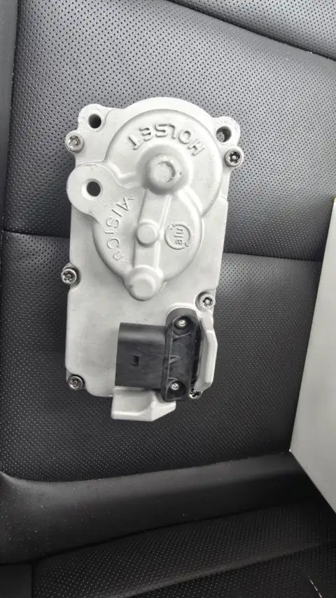 Turbo actuator on the seat of a truck