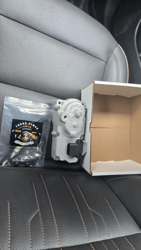 Turbo actuator with its Turbo Reman Center bag and box