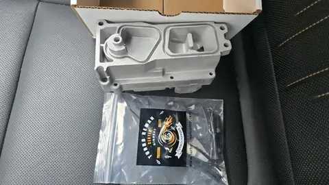 Turbo actuator unpacked next to its bag