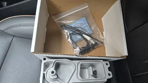 Actuator box with a bag of small parts